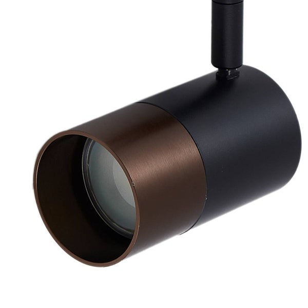 Zylindrischer Strahler mit mattem schwarzem Gehäuse und einem gebürsteten bronzefarbenen Frontring.