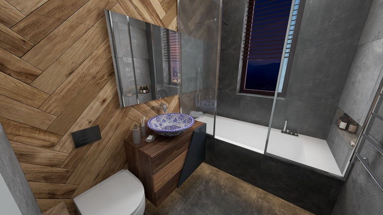 Modernes Badezimmer mit Badewanne, Toilette und Waschbecken mit blauem Muster