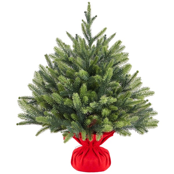 Zwei künstliche Weihnachtsbäume mit rotem Stofffuß