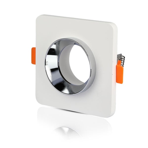 Quadratische Einbauleuchte, 100 mal 100 Millimeter, Höhe 40 Millimeter, mit runder Lichtquelle und seitlichen Montagefedern.