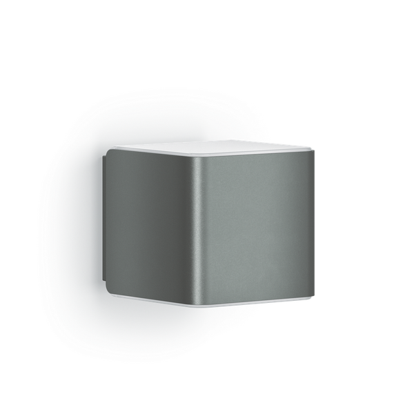 Würfelförmige Wandleuchte für den Außenbereich mit Up und Down Lichteffekt aus Metall.