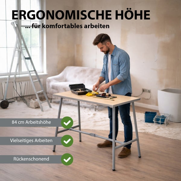 Mann arbeitet an ergonomischer Werkbank mit 84 Zentimeter Arbeitshöhe. Stabiles Metallgestell mit Holzplatte in hellem Raum bei Renovierung.