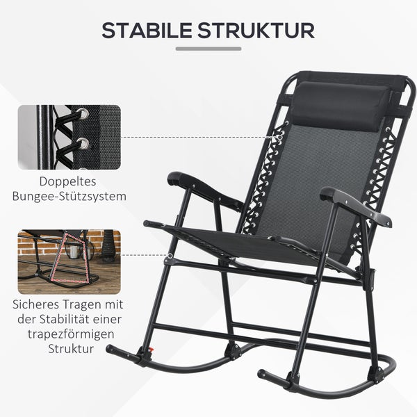 Schwarzes Spülbecken mit Abtropfgestell, Schneidebrett und Armatur in einer Küchenszene.