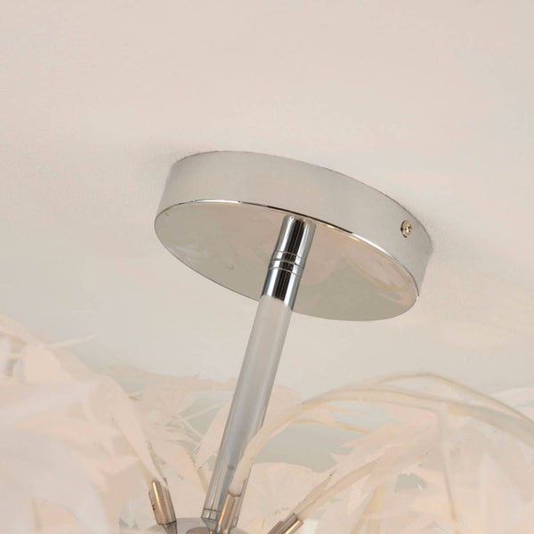 Runde Deckenhalterung für eine Leuchte in Chrom-Optik mit zentralem Metallstab.