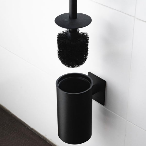 Wandmontierte WC Bürstengarnitur aus Metall mit Halterung in moderner Optik.