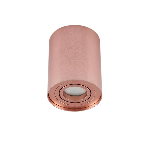 Zylindrischer Aufbaustrahler aus gebürstetem Metall in Kupferoptik mit schwenkbarem Einsatz.