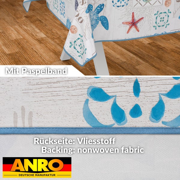 Tischdecke mit Meeresmotiven und Paspelband sowie ANRO Deutsche Manufaktur Logo.