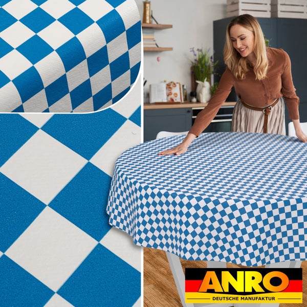 Runde Wachstuch-Tischdecke mit blau-weißem Rautenmuster in einer Küche, Nahaufnahme der Materialstruktur, ANRO Deutsche Manufaktur Logo.