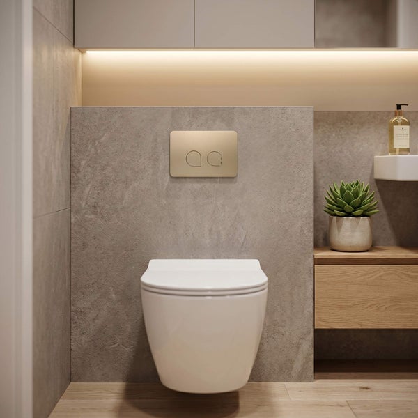 Modernes Badezimmer mit wandhängender Toilette, Betätigungsplatte und Waschbecken auf einem Holzunterschrank mit Pflanzen und indirekter Beleuchtung.