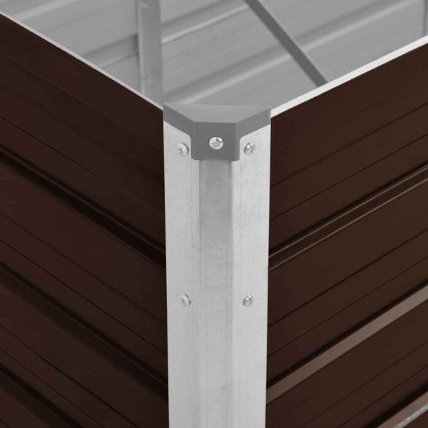 Nahaufnahme der Eckverbindung eines Metall-Hochbeets mit einem verzinkten Eckpfosten und einer grauen Schutzkappe.