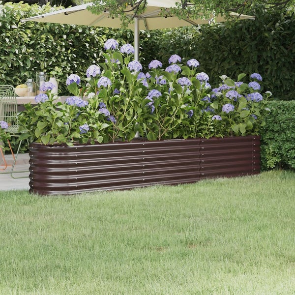Hochbeet aus Metall mit Hortensien im Garten