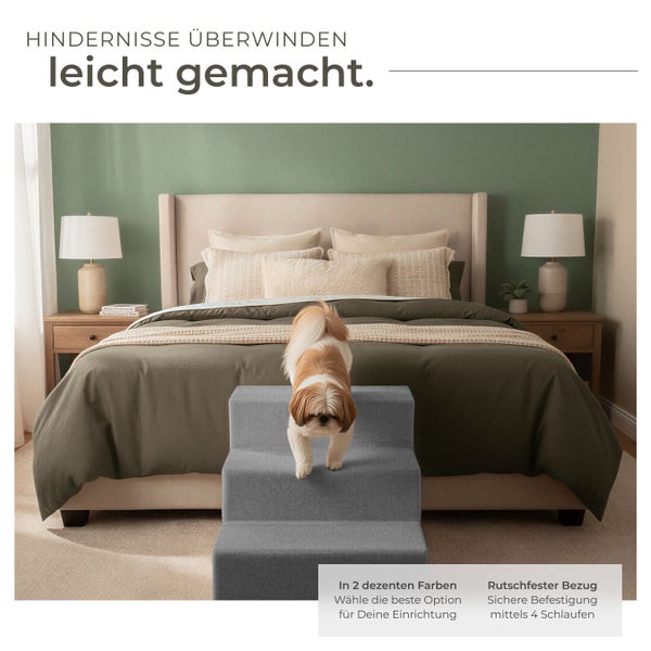 Hundetreppe aus Stoff vor einem Bett mit einem Hund darauf