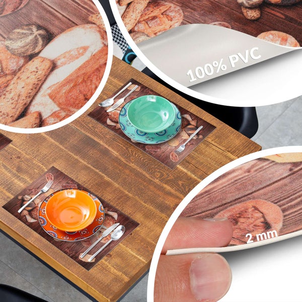 Tischset aus 100 Prozent PVC mit Brot-Motiv, 2 Millimeter dick, auf einem Holztisch mit bunten Schüsseln und Besteck.