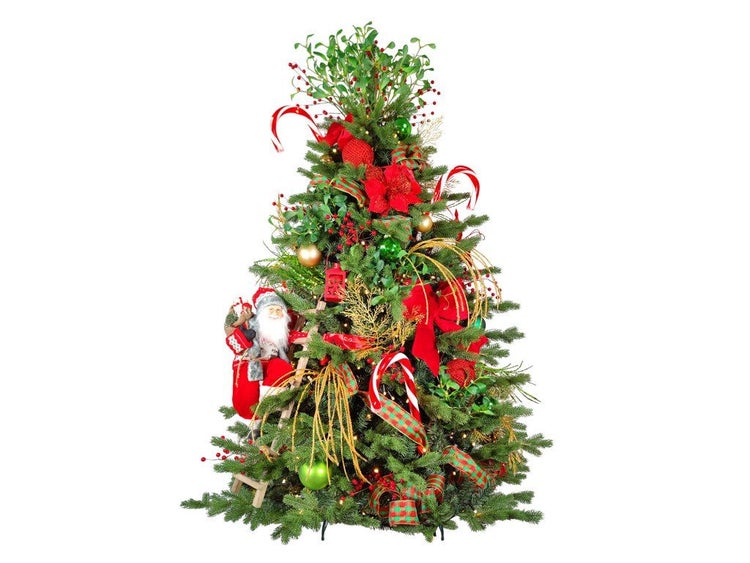 Festlich geschmückter künstlicher Weihnachtsbaum mit Weihnachtsmann Figur, Mistelzweigen, Kugeln und Zuckerstangen.