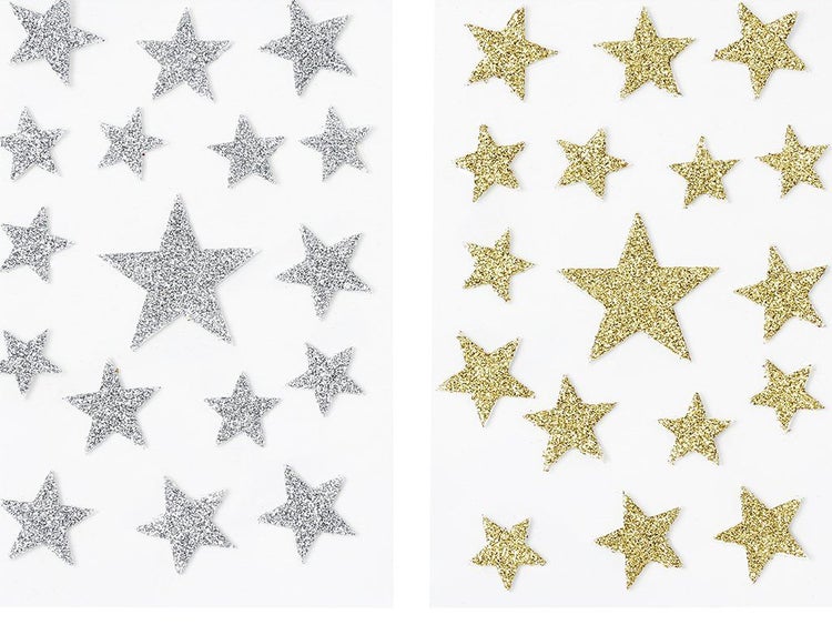 Sticker Set mit glitzernden Sternen in verschiedenen Größen auf Trägerfolie