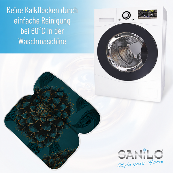 Sanilo WC Vorleger mit Blumenmotiv, waschbar bei 60 Grad Celsius, neben einer Waschmaschine dargestellt.