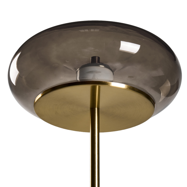 Moderne Stehleuchte mit rundem Glasschirm und Sockel in Metalloptik für eine elegante Beleuchtung im Wohnbereich