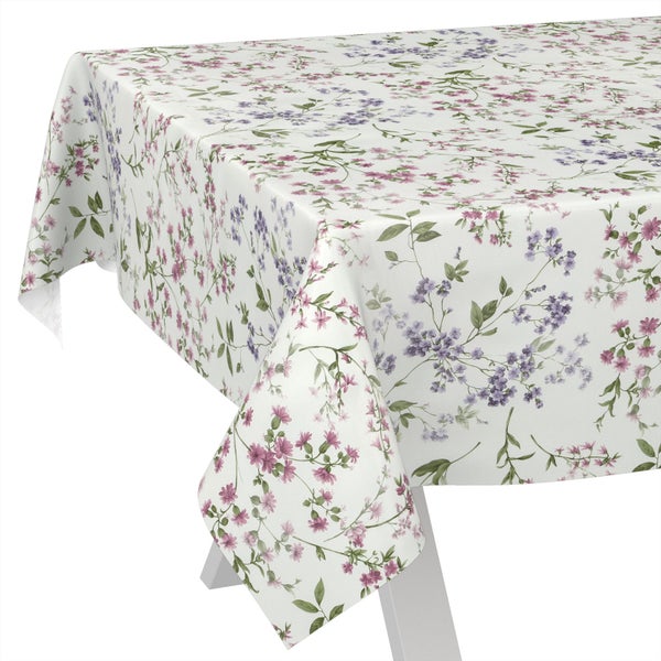 Abwaschbare Tischdecke aus Wachstuch mit floralem Muster aus rosa und violetten Blüten.