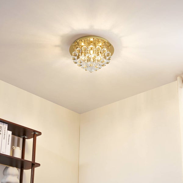 Deckenleuchte mit runder Form und Kristallbehang