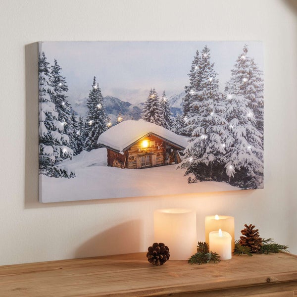 Leinwandbild mit Winterlandschaft, Wald, Hütte und LED-Beleuchtung