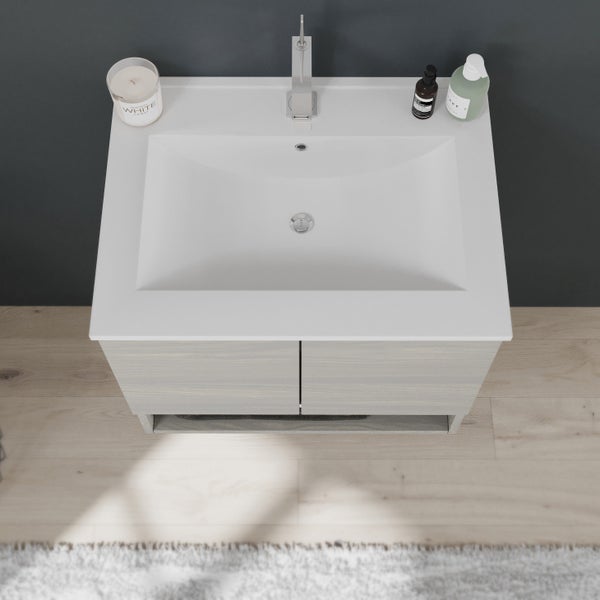 Waschtisch mit Unterschrank, Armatur, Kerze und Seife für das Badezimmer