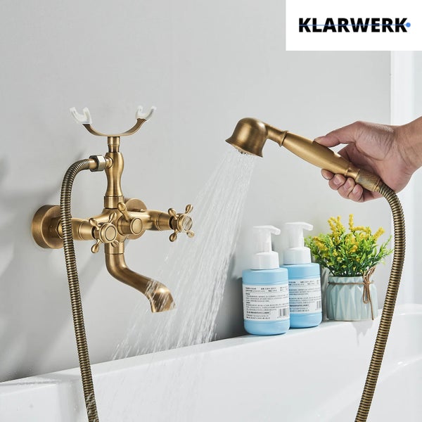 Antike Messing Badewannenarmatur mit Handbrause und Wasserfluss, Klarwerk Logo.