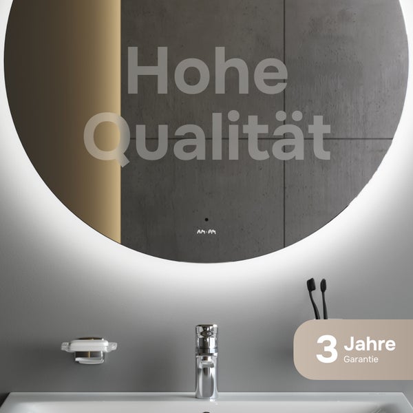 Rund beleuchteter Badezimmerspiegel über einem Waschbecken mit Armatur und Seifenschale. Drei Jahre Garantie.