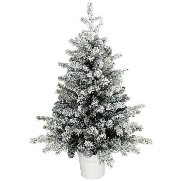 Künstlicher Weihnachtsbaum beschneit im Topf