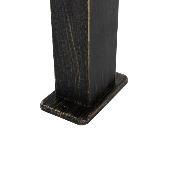 Detailansicht eines Standfußes einer Außenleuchte mit rechteckigem Profil in Schwarz-Gold-Optik.
