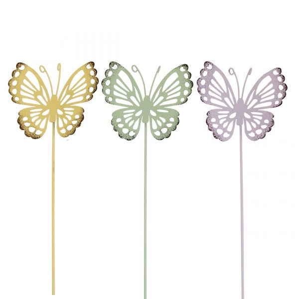 Drei Schmetterlinge auf Stäben als Dekoration