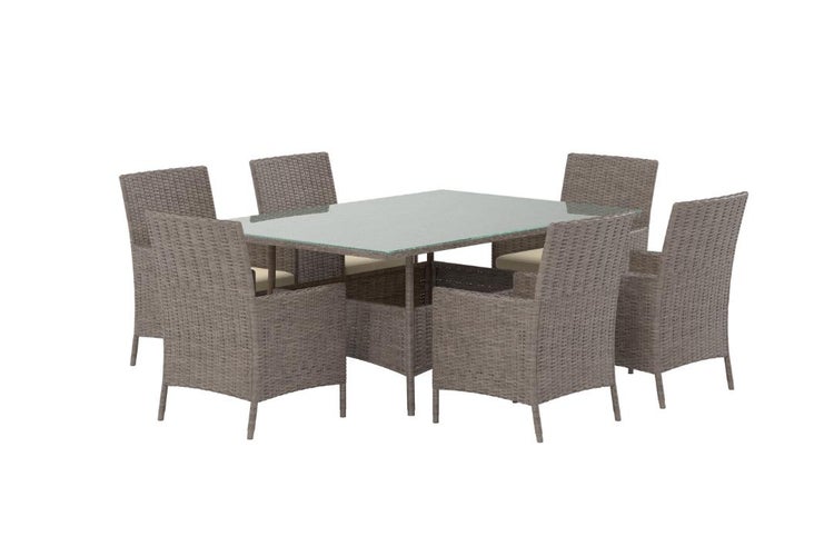 Garten-Essgruppe aus Polyrattan bestehend aus einem rechteckigen Tisch mit Glasplatte und sechs Sesseln inklusive Sitzkissen.