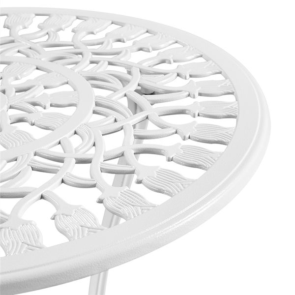 Detailansicht einer runden Gartentischplatte mit floralem Muster.