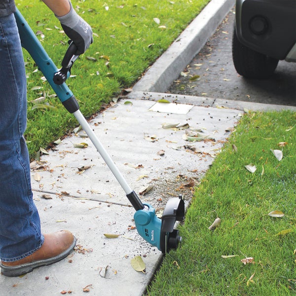 Makita DUR181T Akku-Rasentrimmer 18 V / 1x 5,0 Ah Akku