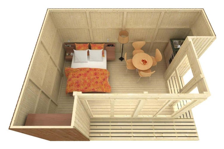 Draufsicht auf den organisierten Innenraum eines hellen Gartenhauses aus Holz mit Doppelbett, Esstisch, Stehlampe und kleiner Küchenzeile.