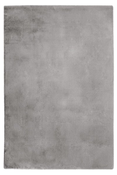 Rechteckiger, weicher Teppich in Grau mit flauschiger Oberfläche.