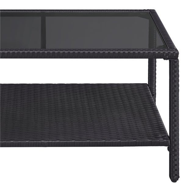 Couchtisch aus Polyrattan mit Glasplatte und Ablagefach für den Garten.