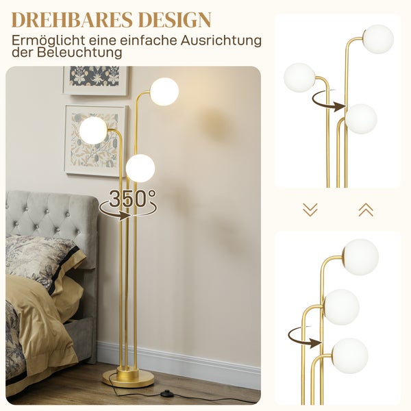 Goldene Stehlampe mit drei drehbaren Kugellampen im Schlafzimmer
