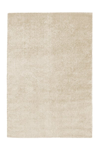 Hochflor-Teppich in Beige, rechteckig, weiche Textur.
