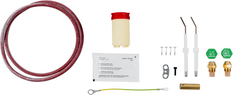 Wartungsset für Brenner mit Dichtungsring, Silikonfett, Zündelektroden, Öldüsen, Erdungskabel und Montageschrauben.