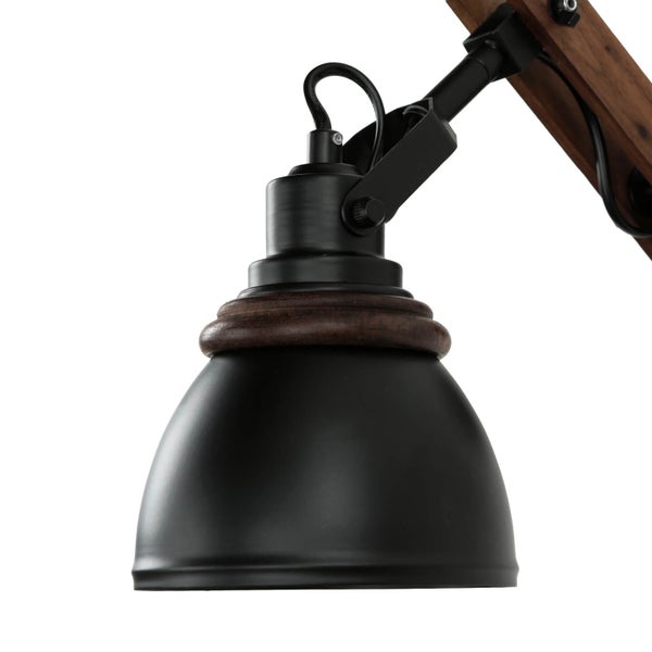 Detailaufnahme einer schwarzen Lampe mit Holzelementen