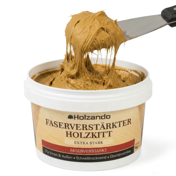 Holzando faserverstärkter Holzkitt in einem weißen Eimer, ein Spachtel entnimmt die zähe, faserige Masse für Innen und Außen.