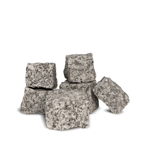 Pflastersteine aus Granit mit bruchrauer Oberfläche.