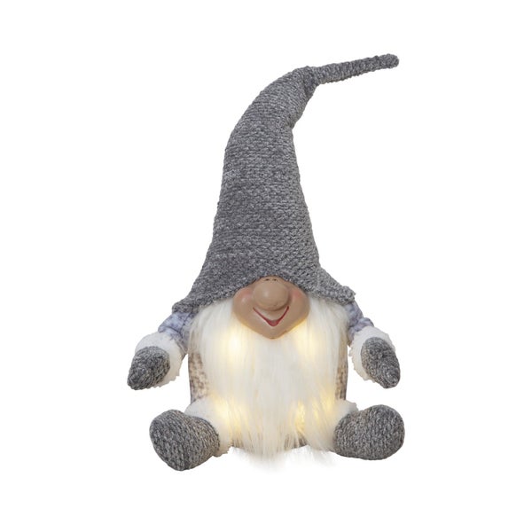 Dekorativer Zwerg mit Bart und Mütze als Weihnachtsdekoration