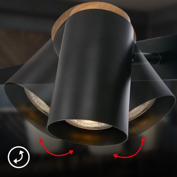 Schwenkbarer Deckenstrahler aus Metall und Holz, schwarz matt, mit verstellbarem Lampenkopf.