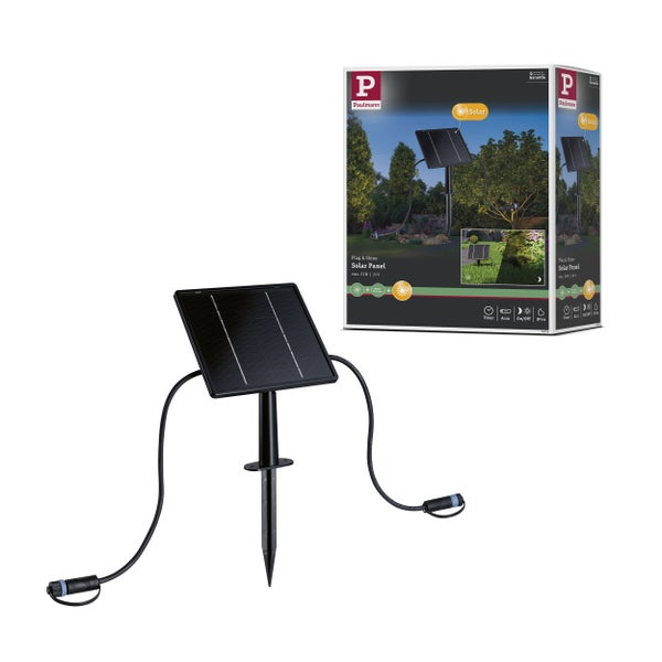 Schwarzes quadratisches Solarpanel mit Erdspieß und zwei Anschlusskabeln für Gartenbeleuchtung.