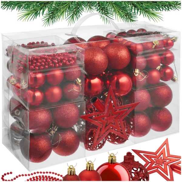 Transparente Box mit Christbaumkugeln, Sternen und Perlenkette