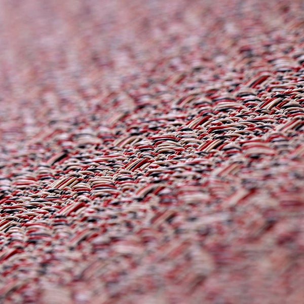 Nahaufnahme eines gewebten Teppichs