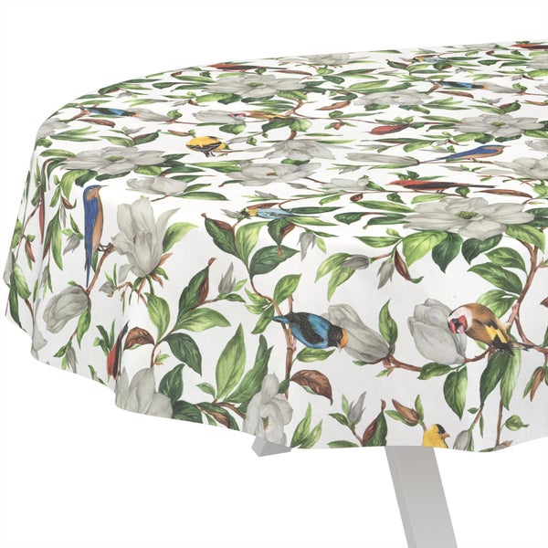 Runde Tischdecke mit einem Muster aus Vögeln, Magnolien und Blättern.