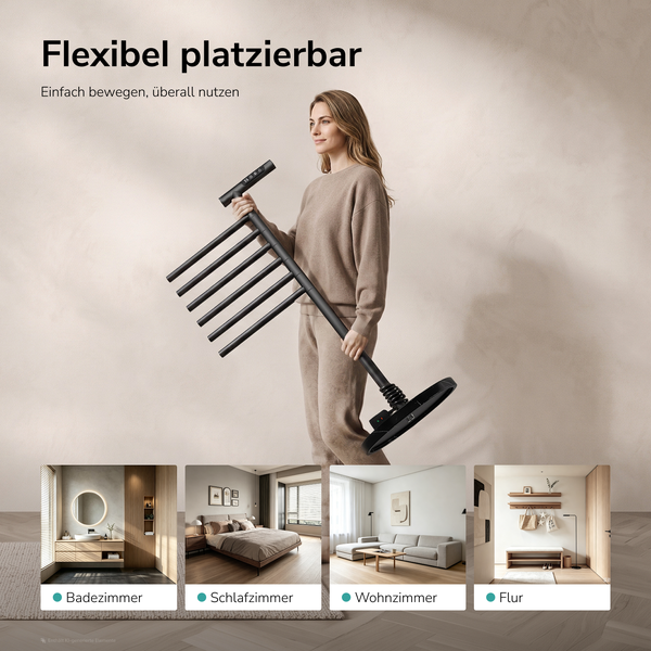 Eine Frau hält einen freistehenden, mobilen Handtuchheizkörper, der vielseitig in Bad, Schlafzimmer, Wohnzimmer und Flur einsetzbar ist.