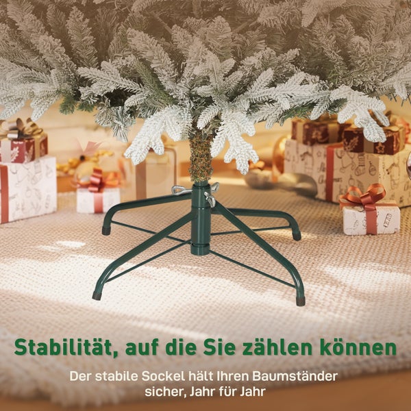 Stabiler Weihnachtsbaumständer aus Metall in Grün für künstliche Tannenbäume, umgeben von Geschenken.